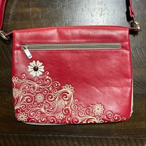 Red Espe purse. Can be worn as a shoulder bag or cross body bag.